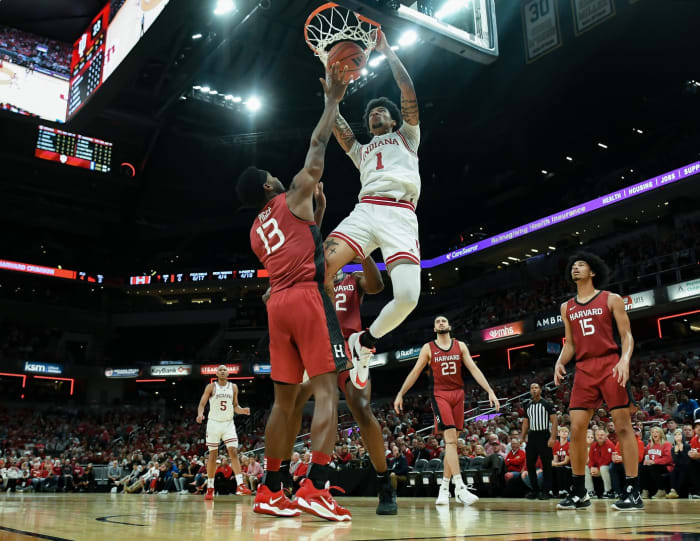 Indiana Hoosiers center Kel'el Ware (1) dunks the ball against Harvard Crimson guard Chandler Pigge (13) during the game against Harvard in Gainbridge Fieldhouse.